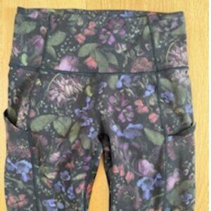 LULULEMON FAST AND FREE HIGH RISE TIGHT SIZE 4  BLACK WITH MULTI COLOR FLORAL
